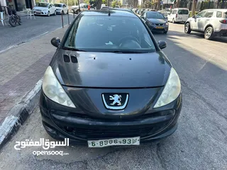  1 بيجو 206 بلس