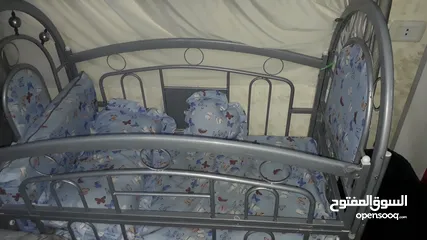  1 تخت اطفال حديد