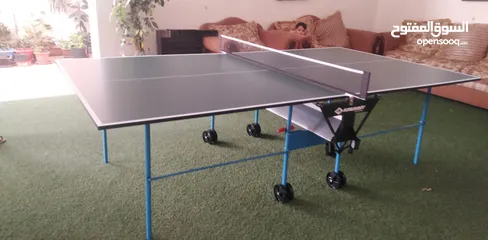  1 طاولة تنس الماني اصلي ثقيل جديد بالكرتونه