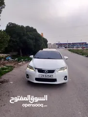  1 سياره لكزس سي تي 2012 ابيض  الفحص مرفق مع الصور