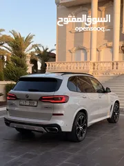  9 BMW X5 2020 M Sport plug in وارد الشركة اعلا صنف فحص كامل لون مميز بسعر مغرري السياره بحاله الوكاله