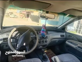  10 لانسر موديل 2005 قير عادي متور 1300