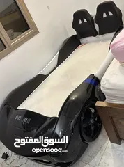  1 سرير على شكل سيارة شرطة