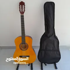  1 new classical/acoustic guitar with bag! delivery!جيتار كلاسيكي/أكوستيك جديد مع حقيبة! التوصيل!