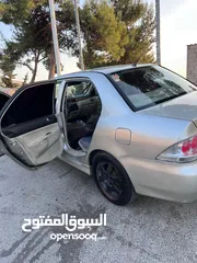  6 ميتسوبيشي لانسر 2006 وارد لكويت للبيع كاش