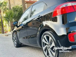  17 كيا ريو 2016 فل مع فتحه مميزه لون اسود نادر ومميز بالنضافه