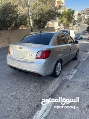  4 للبيع كيا ريو موديل 2009 فحصها نخب
