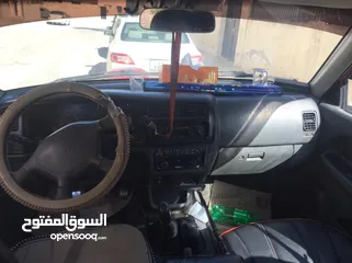  5 (متسوبيشيL200 لون احمر موديل 2005 للبيع) 4×4