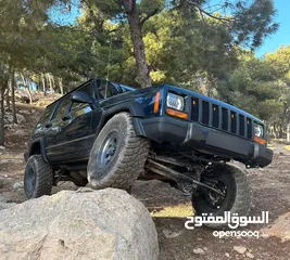  22 للبيع - جيب شيروكي XJ موديل 1999  جاهز للبر والمغامرات!