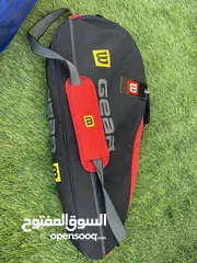  3 كرات تنس إرضي ومضارب