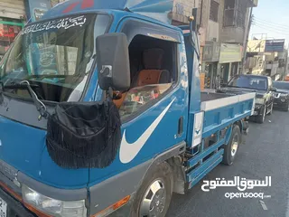  2 قلاب متسوبيشي كانتر مترين اصلي للبدل على قلاب عريض 2007