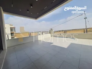  2 شقة ارضية مع ترس للبيع في رجم عميش بمساحة بناء 215م