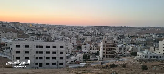  1 ارض دونم بالكوم مع منسوب تصلح للاسكانات مطلة صخرية