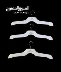  2 Wooden Hangers  Used  Good Condition  Price per pc 0.300 fils only  Qty 300 pc Available