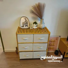  1 مع خزانة البامبو  بـ6 أدراج قماشية متينة   تصميم طبيعي وراقي يناسب جميع الديكورات  أدراج واسعة
