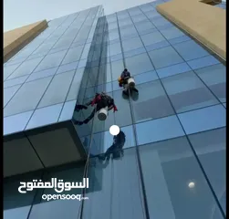  1 تنظيف واجهة المباني زجاجية