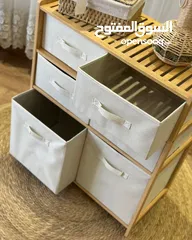  1 مع خزانة البامبو  بـ6 أدراج قماشية متينة تصميم طبيعي وراقي يناسب جميع الديكورات .