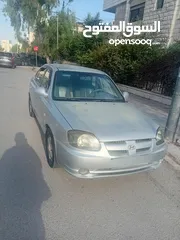  1 هونداي فيرنا لون سلفر موديل 2004 مرخصة  فحص 4 جيد للبيع بشكل مستعجل