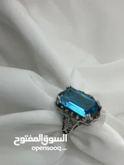  6 *خاتم فضة بحجر أكوامارين – عيار 925، وزن 5.4 جرام