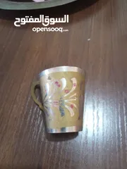  8 اطقم نحاسيات قديمه ورسم يدوي جميل