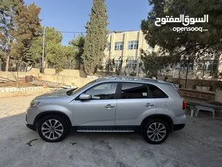  15 جب كيا سورينتو 2015 ولا ضربة ماشي 126 كيلو فقط 7 ركاب 4x4