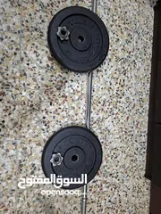  2 Weight plates and Barbell for sale 50 kg. No Delivery.