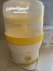  4 Beurer bottle warmer and sterilizer Beurer معقم قناني و تسخين قناني