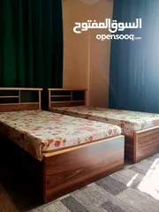  1 تخت خشب مفرد مستعمل