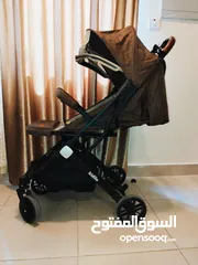  13 عرباية شارع للأطفال تتحول تخت قابله للطي -نوع كيدلو استخدم شهرين تتسع لطفليين