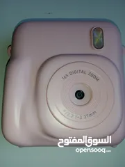  4 كاميرا تصوير فوري للبيع  جديدة  بالإضافة ل ميموري كارد (ذاكرة) وتشمل 3 رولات من بطاقات الطباعة +شاحن