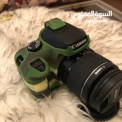  1 عدسة 55-18  تبديل بـ 50mm ونزيدك الفرق