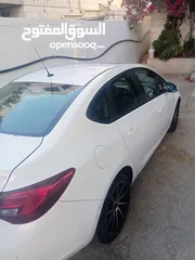  8 سياره اوبل استرا سيدان 2013
