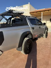  3 Mitsubishi Sportero