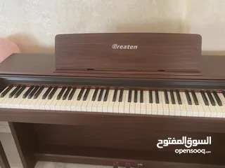  4 Greaten piano new model amazing brownish black color no key broken functioned with metronome