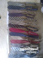  2 ربطات عنق بدلات رجالي الوان وأشكال مختلفه العدد 60 وحده سعر نصف دينار