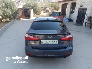  2 كيا سيراتو موديل 2014 ما شاء الله فول اضافات فتحة سقف حساس امامي خلفي شركة ليد امامي وخلفي سبويلرات