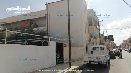  2 بنايه وسط مدينة المفرق للبيع