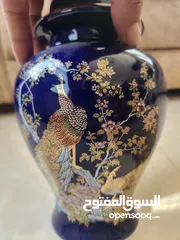  13 فاز انتيك قديمه لون ازرق رسمة طاووسين مذهبين يوجد كسر خفيف غير مؤثر على الشكل العام(نوادر)
