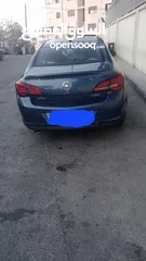  6 أوبل أسترا 2015 أوتاماتيك ماتور 1400 سي سي تيربو فتحة بالسقف لون أزرق