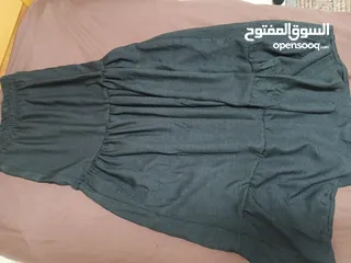  1 تنورة سوداء طويلة