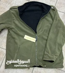  4 جاكيت شتوي سميك بخامة فليس أصلية، دافئ وأنيق، وتقدر تلبسه على الجهتين لتبديل إطلالتك فورًا