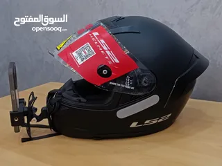  15 خوذت LS2   حجم XL  الون كاتم  جديده مع مستلزمات 3 اقنعه للوجه مع ستاند للكمره وجوال. وعلاقه للخوذه