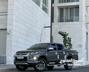  2 ميتسوبيشي L200 2022 لون بني مميزه فحص كامل كرت ابيض 7 جيد اتوماتيك