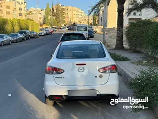  11 مازدا زوم 2 موديل 2012 فحص كامل 7 جيد ولا ملاحظة لون ابيض قاطعة مسافة 100 الف كيلو فقط (استخدام شخصي