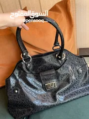  1 شنطة جيس مستعملة للبيع guess