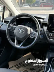  9 تويوتا كارولا ترخيص 2022 محرك 1800 هايبرد جير أوتوماتيك 170 حصان