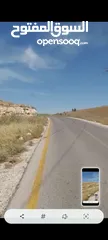  6 ارض للبيع 10 دونمات واجه 100 متر على شارع 20 معبد تبعد عن اشاره بلعما 1500 متر