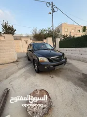  4 جيب كيا سرنتو موديل 2009 خالي من الضربات موتور وقير الف افحص وين بدك