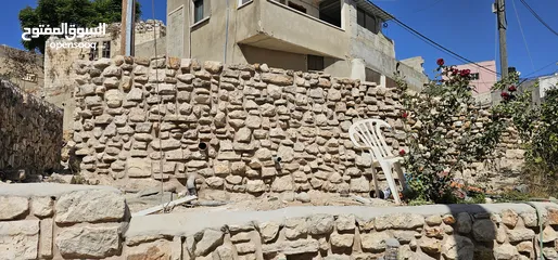  3 بناء حجر طبيعي