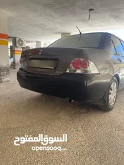  9 ميتسوبيشي لانسر GLX وارد خليجي اصلي